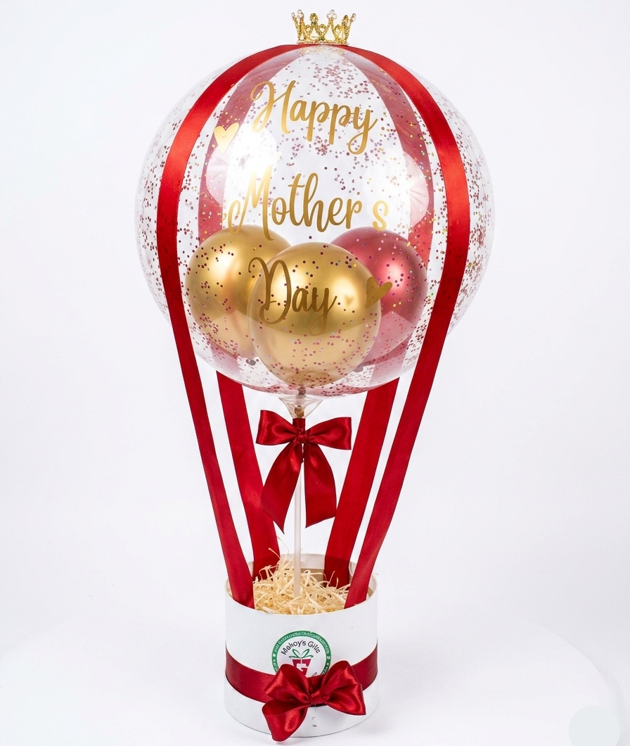 Decorative balloon with 'Happy Mother's Day' text, gold balloons, and red ribbons on a white background.