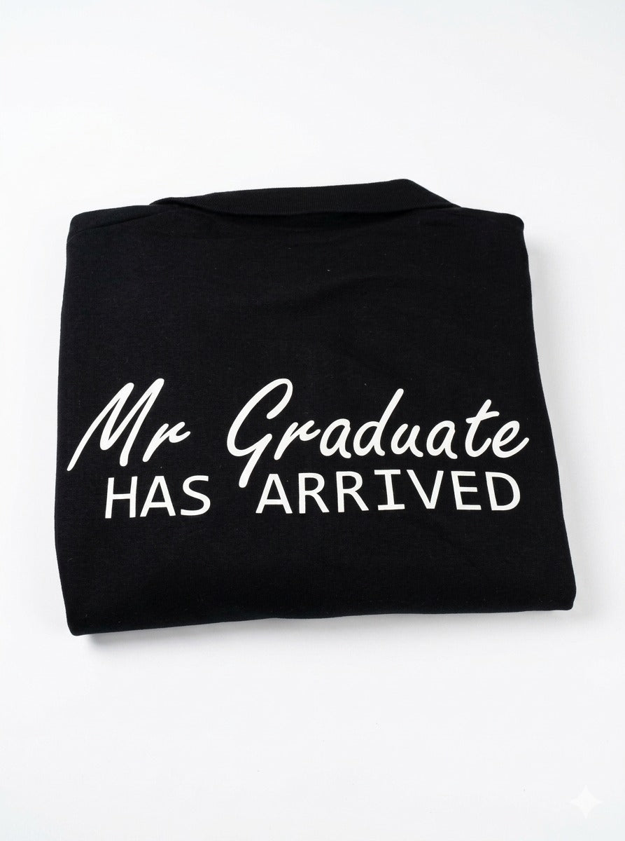Black t-shirt with 'Mr Graduate Has Arrived' text on a white background