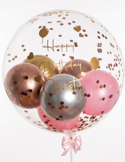 Clear balloon with gold, pink, and silver balloons inside, featuring 'Happy Birthday Christy' text.