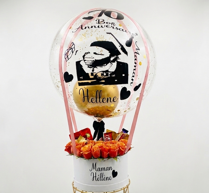 Decorative balloon with flowers and personalized text on a white background