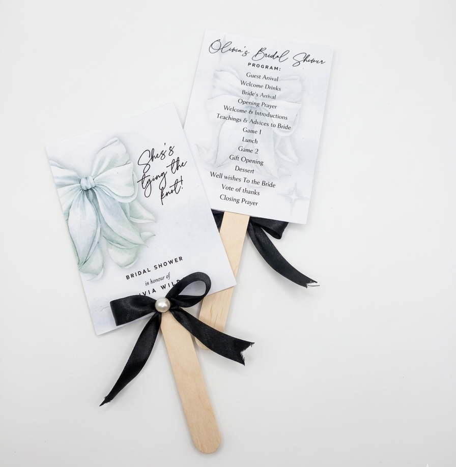 Bridal shower invitation with a bow on a white background
