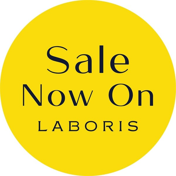 Yellow circle vinyl sticker  with 'Sale Now On LABORIS' text