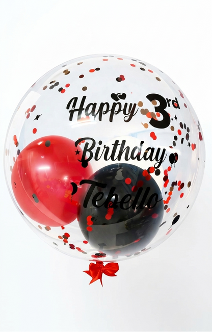 Transparent balloon with red heart, black circle, and confetti, featuring 'Happy 3rd Birthday Tebello' text.