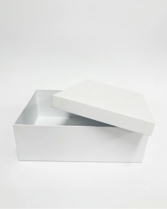 White rectangular box with a lid on a white background