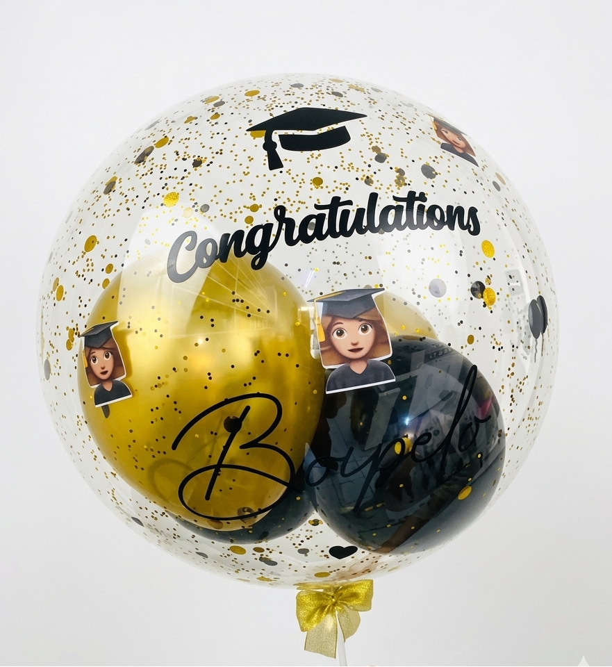 Graduation-themed balloon with confetti, 'Congratulations' text, and graduation cap design on a white background.