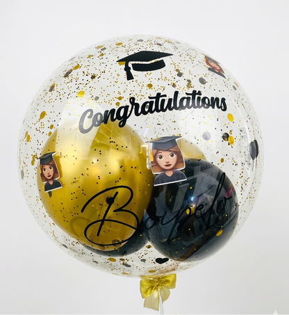 Graduation-themed balloon with confetti, 'Congratulations' text, and graduation cap design on a white background.