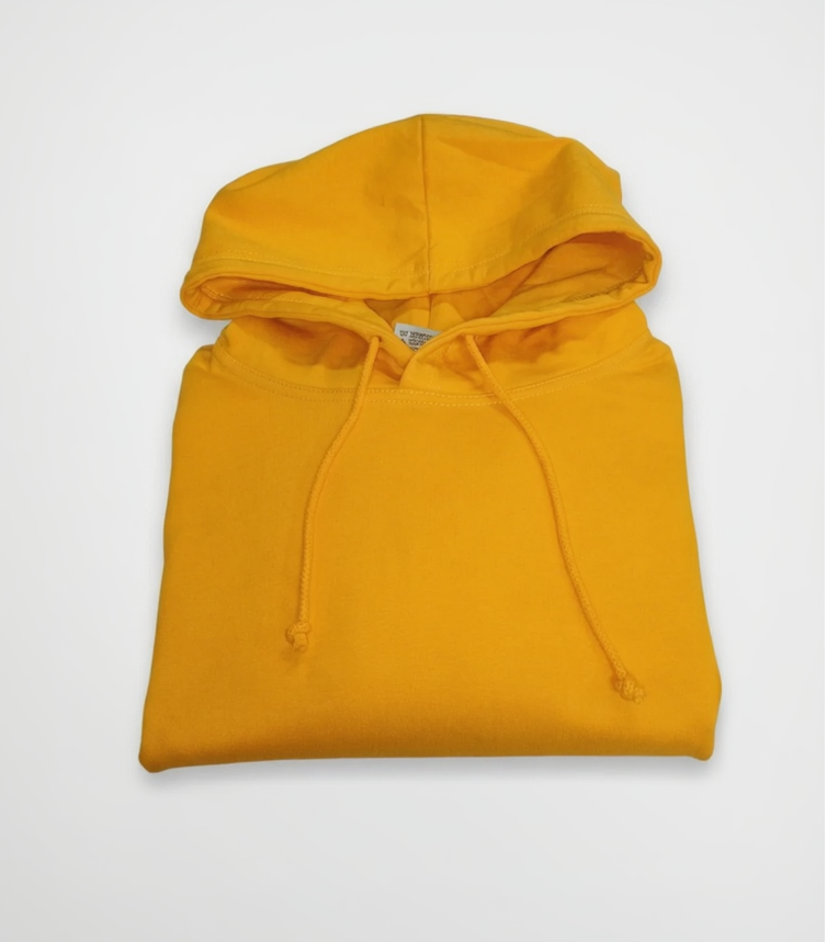 Folded yellow hoodie on a white background