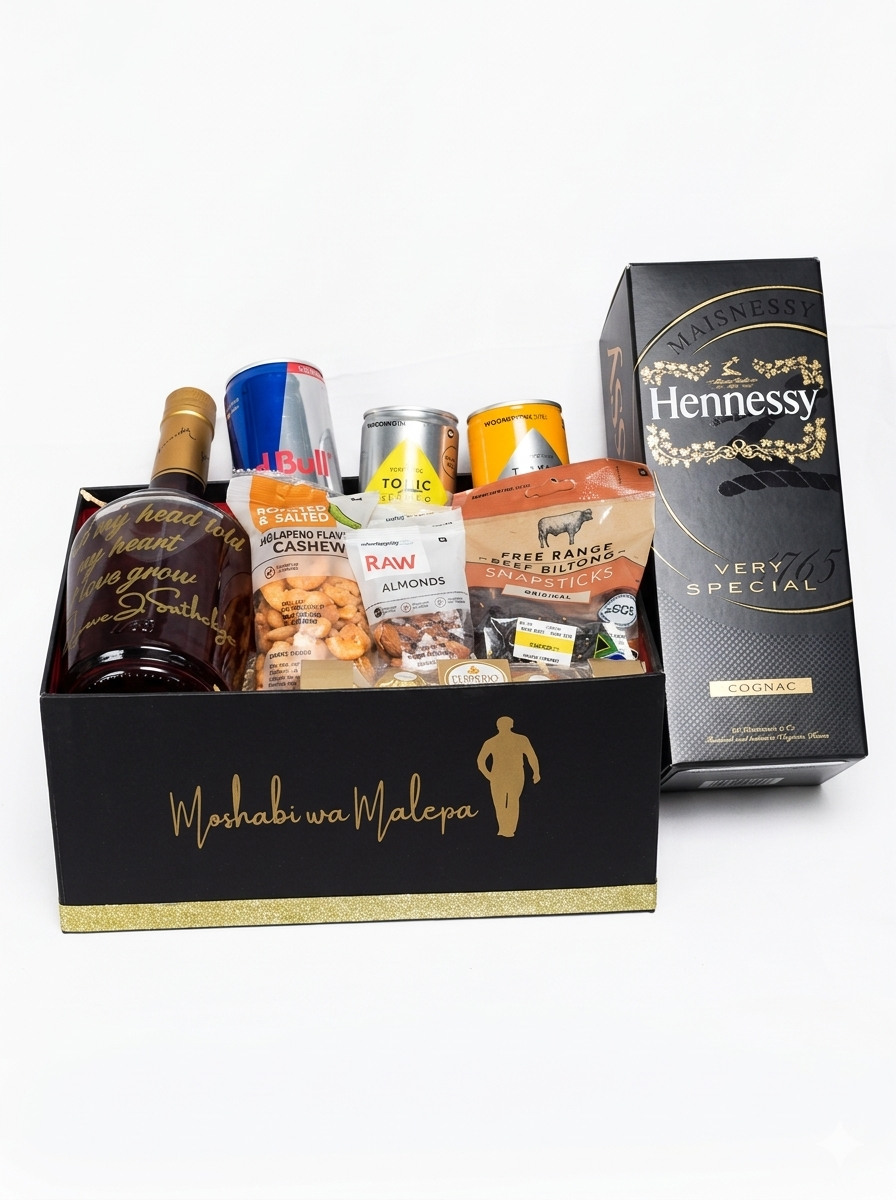 Gift basket with Hennessy bottle and snacks on a white background