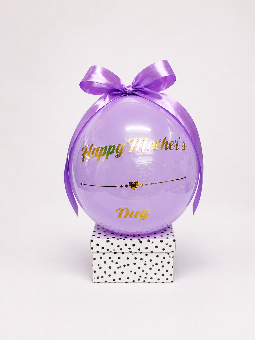 Purple balloon with 'Happy Mother's Day' text on a white background