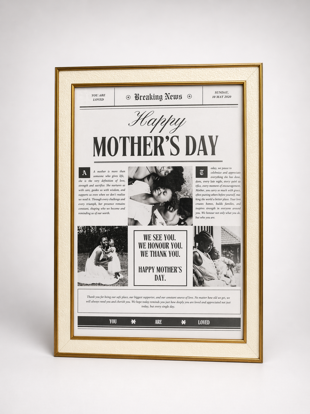 Framed newspaper with 'Happy Mother's Day' text and images on a white background