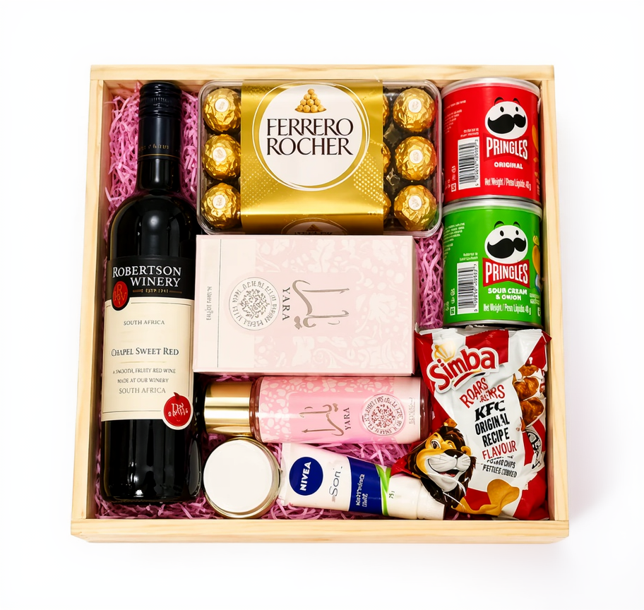 Gift set with wine, snacks, and personal care items in a wooden box.