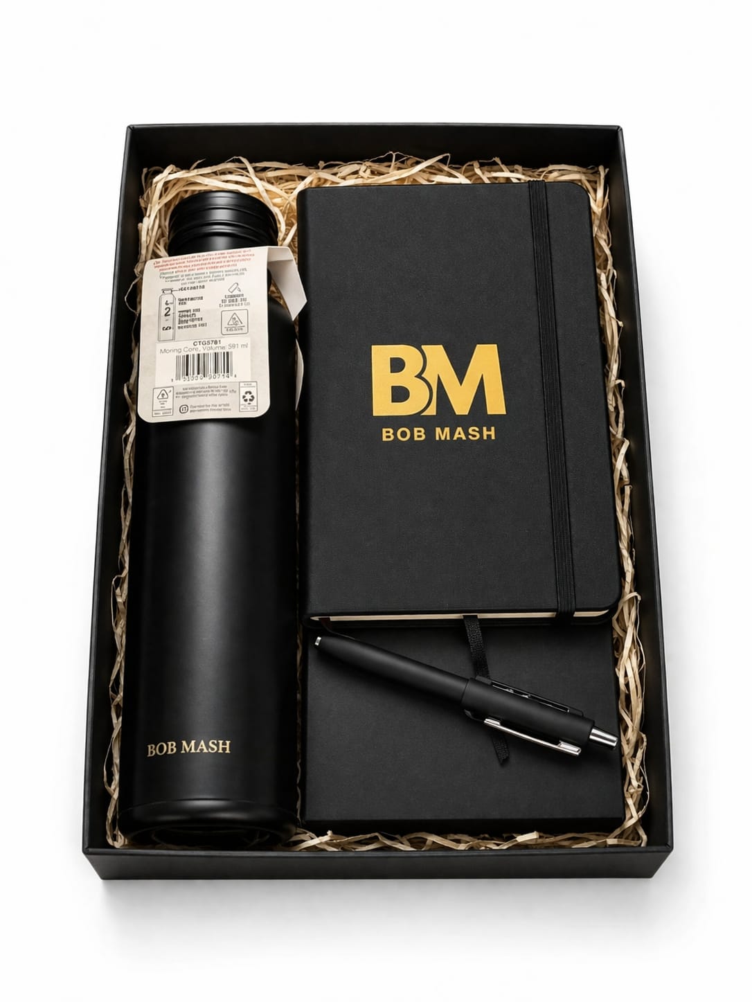 Black gift set with 'BM' branding including a thermos, notebook, and pen.