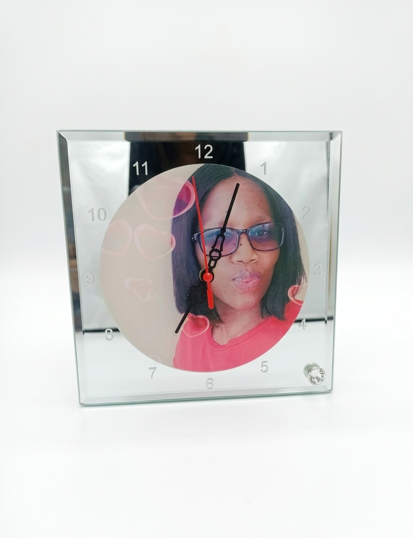 Glass clock on a white background