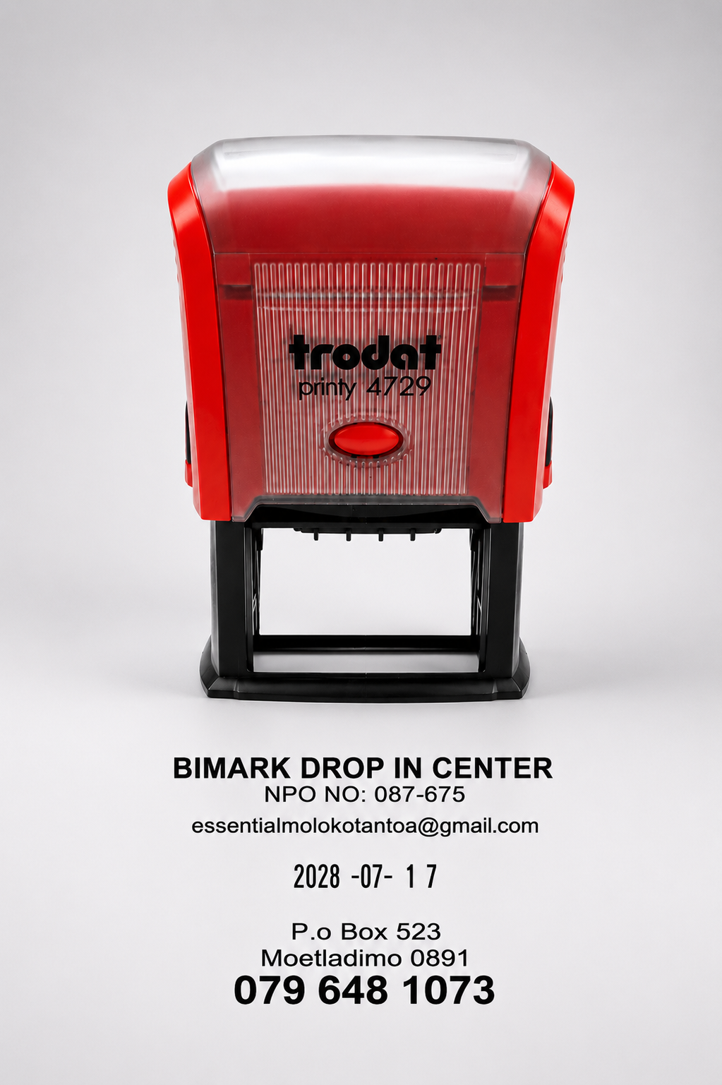Red and black Trodat stamp on a gray background with contact information below.