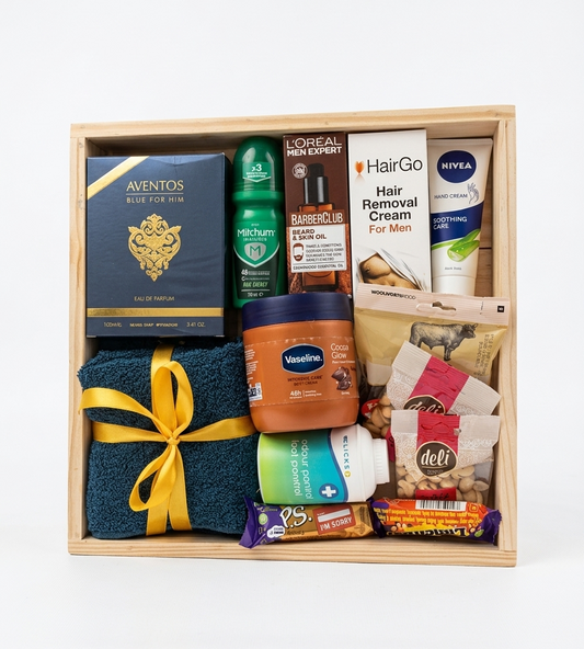Gift basket with various items including toiletries and a pair of socks on a white background