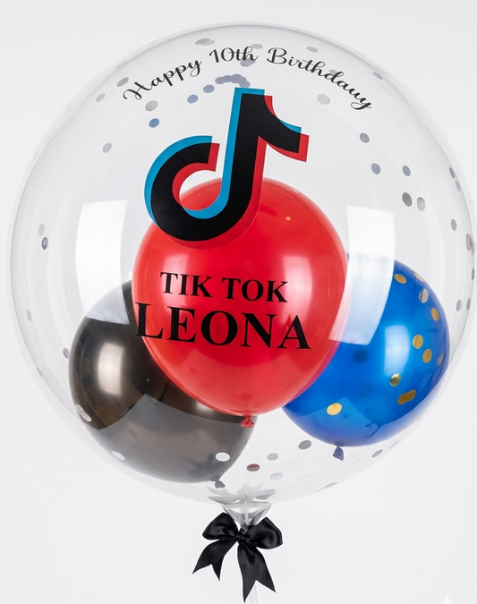 Clear bubble balloon with TikTok logo and balloons inside, celebrating a 10th birthday for Leona.