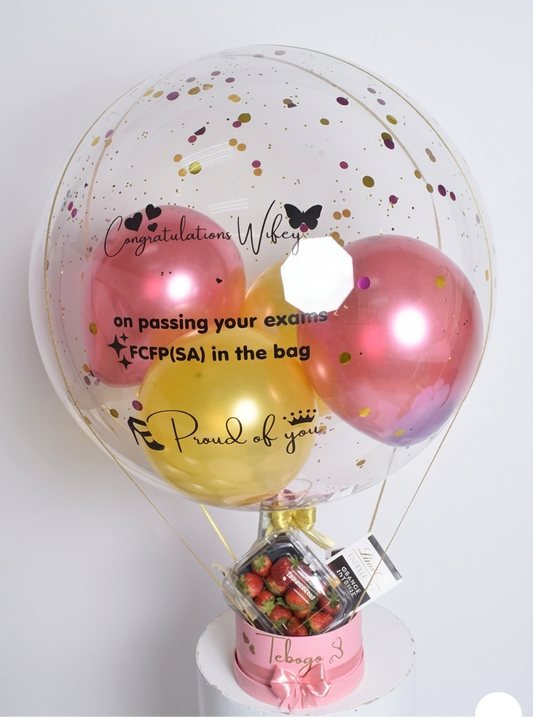 Decorative balloon with confetti and personalized text on a white background