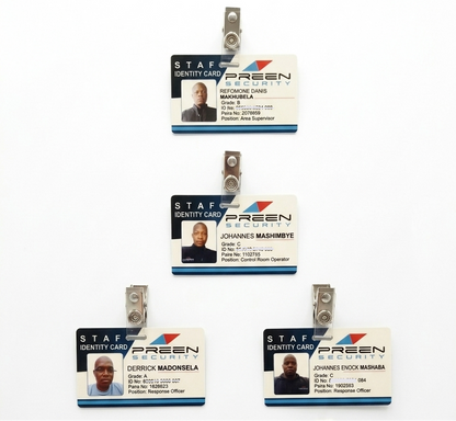 Set of five identity cards with clips on a white background